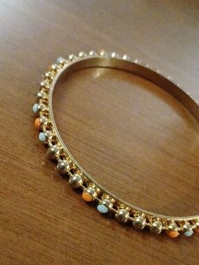 Gold Tone Women's Bangle Bracelet with Blue and Coral Accents